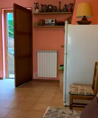 Appartam. in villetta con giardino e posto auto