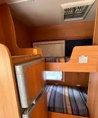 Camper - Challenger Genesis 49 Camper - Challenger Genesis 49