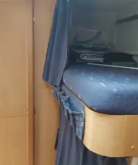 Camper mansardato