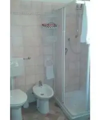 Camere doppie triple angolo cottura