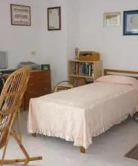 appartamento in villa giardino -box auto COD. 129