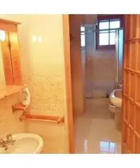 Casa singola angolare con box