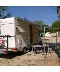 Camper mansardato con portamoto portatutto