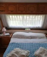 Roulotte con preingresso e pompeiana camping Roana