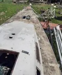 Cabinato a vela in legno da restaurare